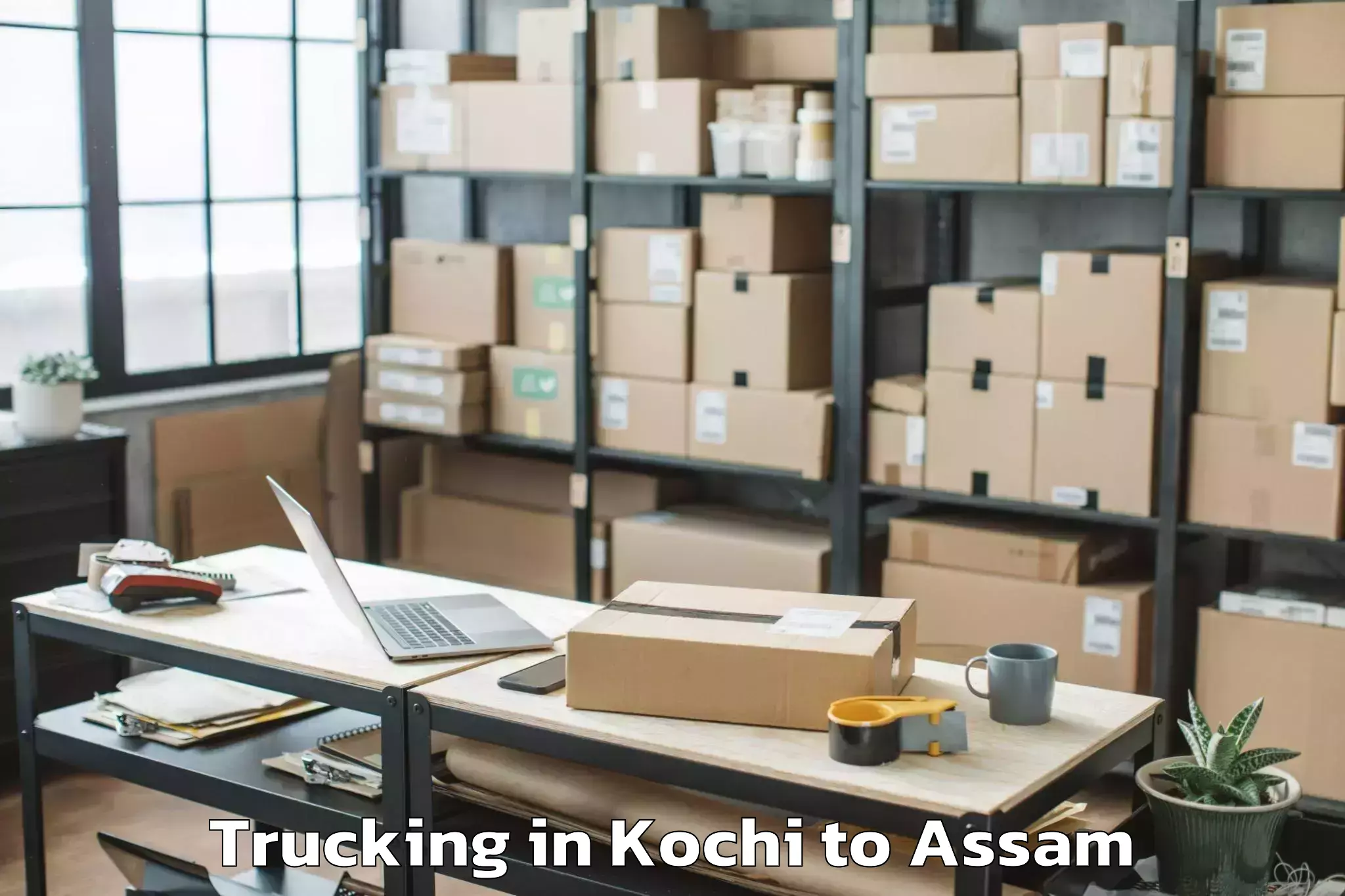 Book Kochi to Dibrugarh Trucking Online